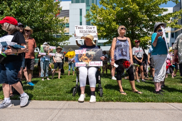 Crowd of supporters with signs outside St Jospeh's Hospital
