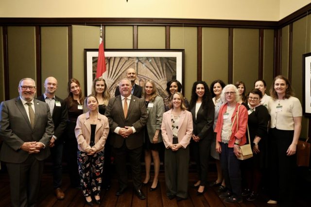 Parliamentarians, scientists, and and the Animal Justice team at an event on ending animal testing in Canada.
